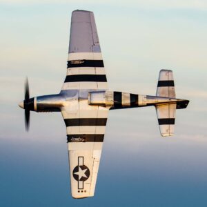 Silver P-51 Mustang with invasion stripes seen from above