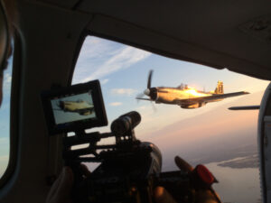 Monitor showing a warbird during air-to-air filming
